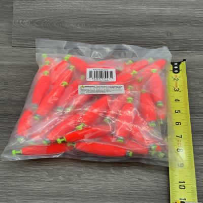 F J NEIL 2 1/2" WEIGHTED CIGAR FOAM FLOATS FLUOR RED.